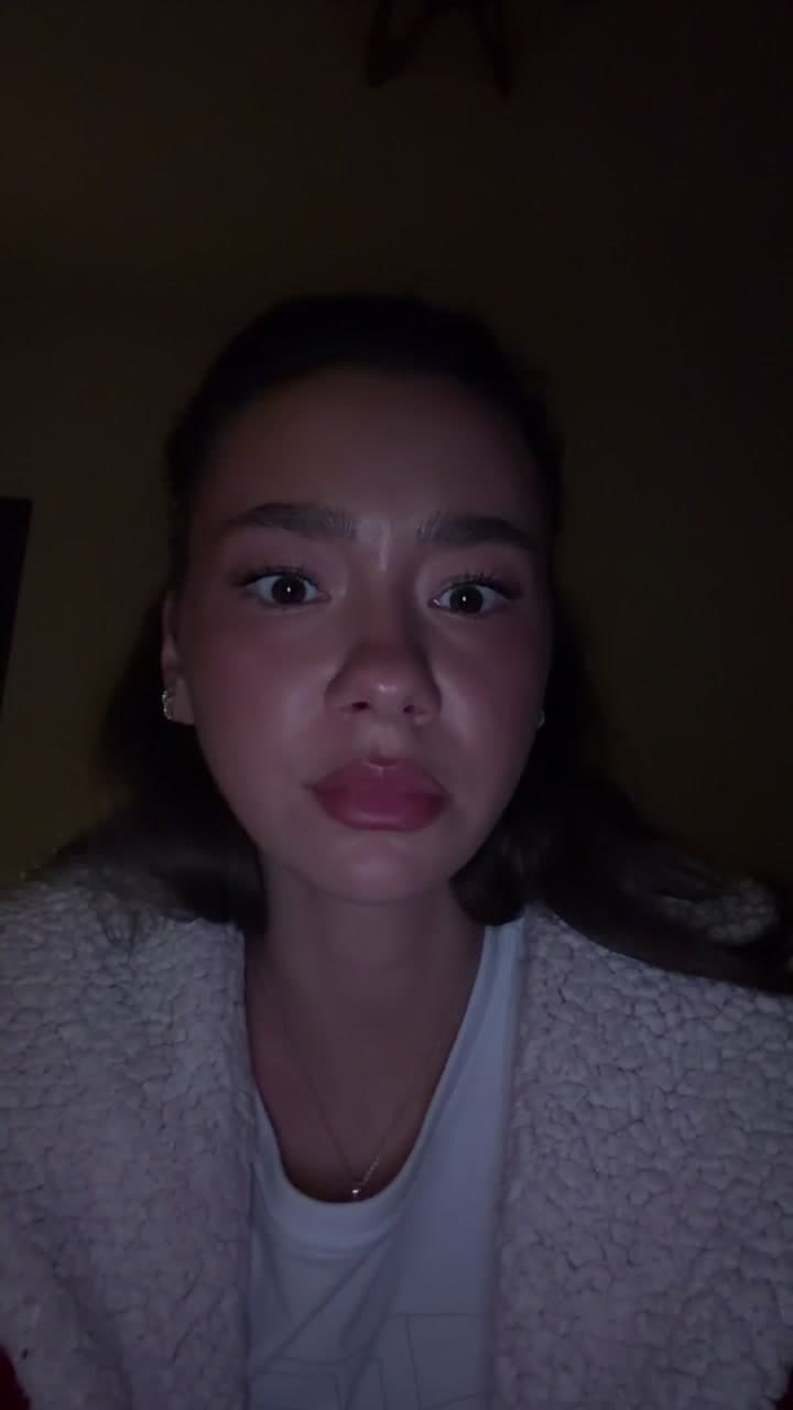 Woman Gasps in Shock Covering Mouth