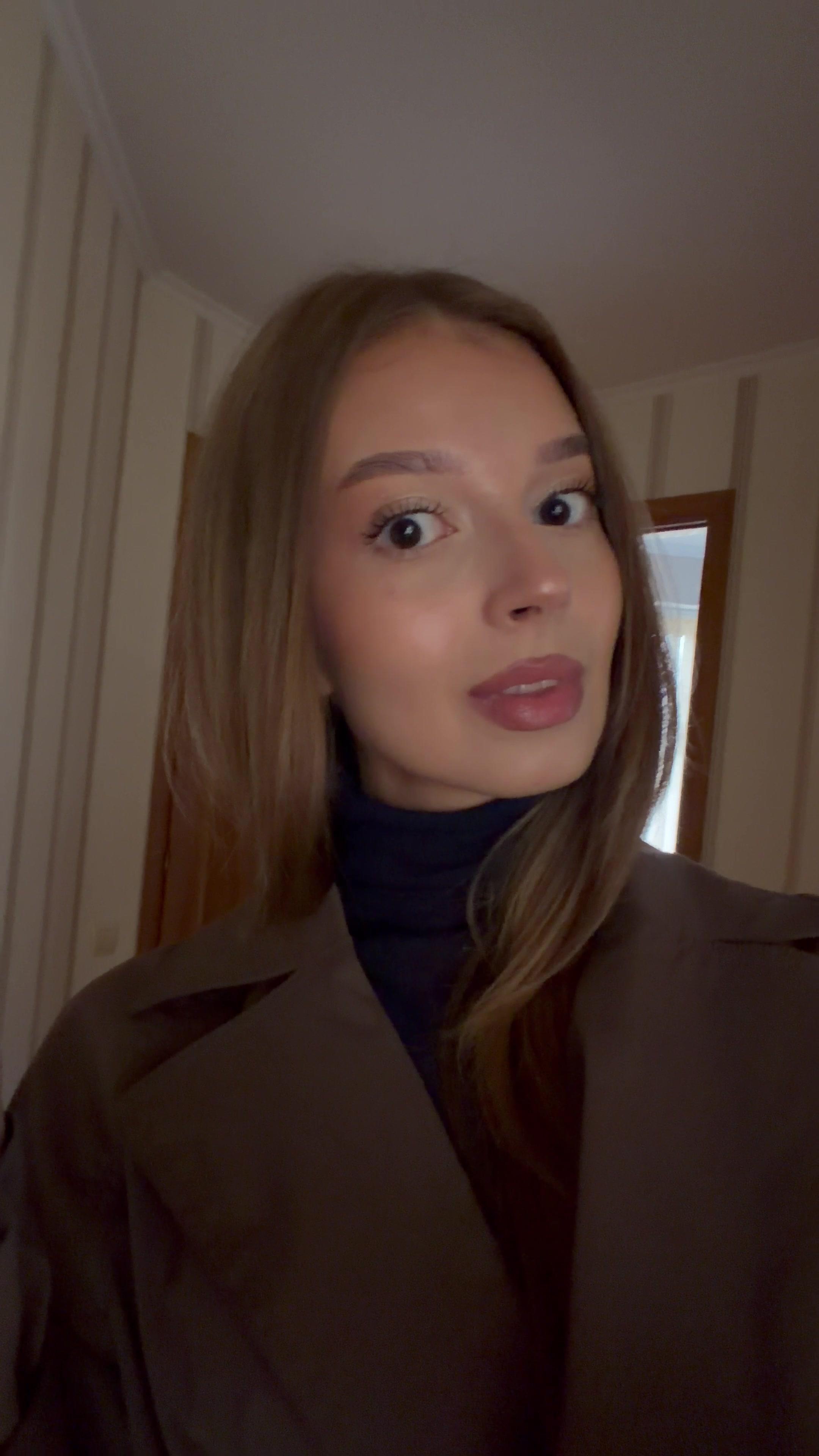 Young Woman Reacting in Shock and Disbelief